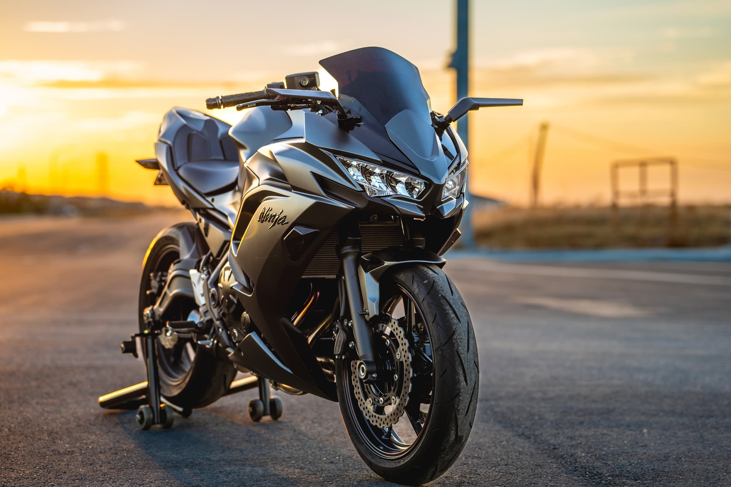 Motorcycle parked in warm sunset light